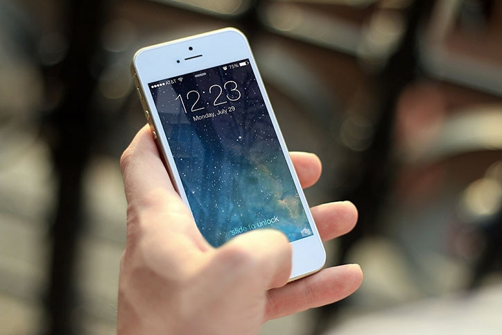 Smartphone shown displaying the time.