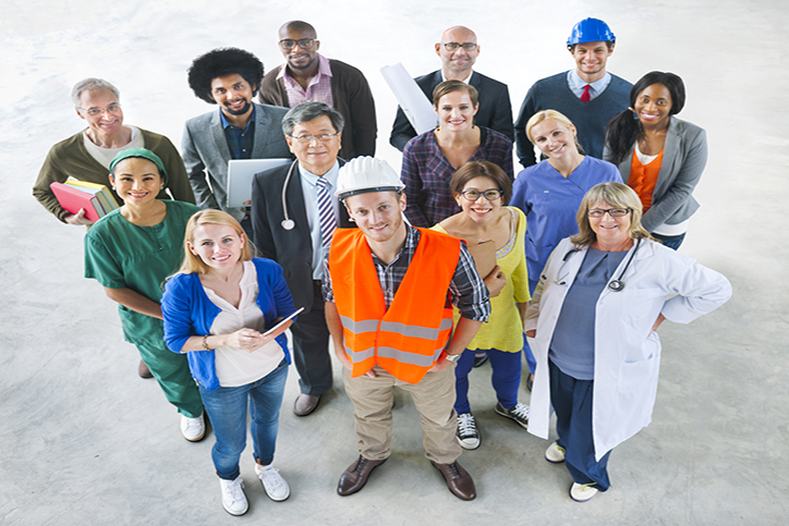 A group of people dressed in their different career outfits